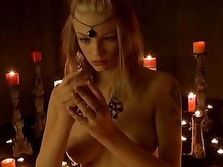 Ritual with candles and masturbating