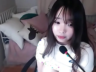 Korean dame masturbates on cam